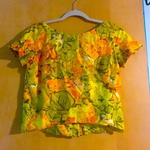Vintage cropped top with orange and yellow flowers and green leaves